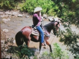 Dad on trail ride (playing the harmonica)